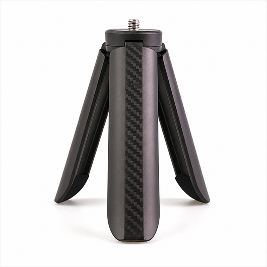A black carbon fiber mini tripod with a textured weave pattern on the center leg and a threaded screw base, shown on a clean white background.
