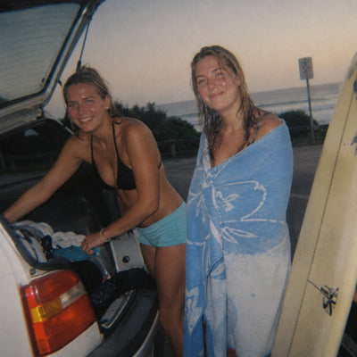 Drying off next to a van at a surf carpark